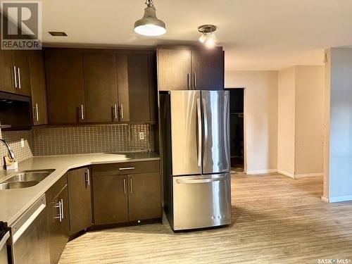 102 405 5Th Avenue N, Saskatoon, SK - Indoor Photo Showing Kitchen With Double Sink