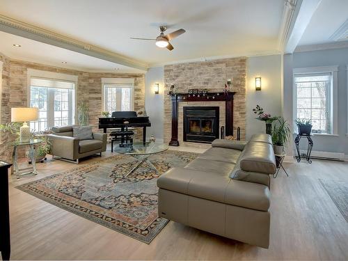 Living room - 1264 Rue Robert, Prévost, QC - Indoor Photo Showing Living Room With Fireplace