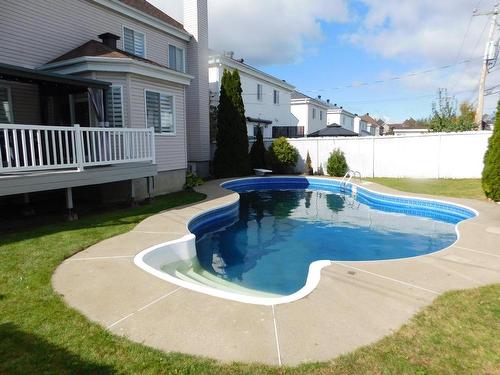 Cour - 1825 Rue Charles-Smallwood, Laval (Chomedey), QC - Outdoor With In Ground Pool With Deck Patio Veranda With Backyard