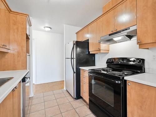 Cuisine - 410-1500 Rue Palerme, Brossard, QC - Indoor Photo Showing Kitchen