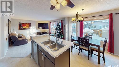 1607 Rousseau Crescent N, Regina, SK - Indoor Photo Showing Kitchen With Double Sink