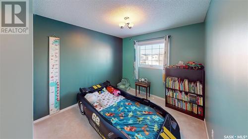 1607 Rousseau Crescent N, Regina, SK - Indoor Photo Showing Bedroom