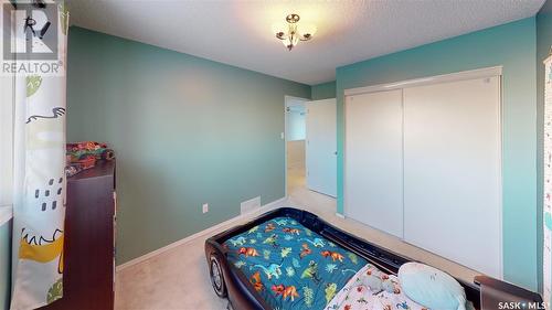 1607 Rousseau Crescent N, Regina, SK - Indoor Photo Showing Bedroom