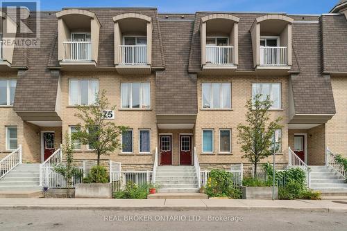 127 - 75 Turntable Crescent, Toronto, ON - Outdoor With Facade