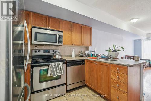 127 - 75 Turntable Crescent, Toronto, ON - Indoor Photo Showing Kitchen With Double Sink