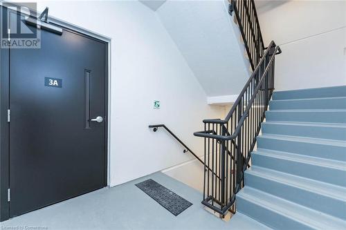 Stairs featuring concrete floors - 741 King Street W Unit# 301, Kitchener, ON - Indoor Photo Showing Other Room