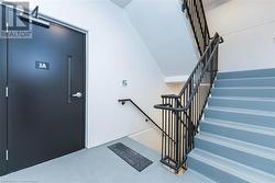 Stairs featuring concrete floors - 