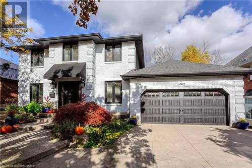 View of front of property featuring a garage - 659 Deervalley Road, Ancaster, ON - Outdoor