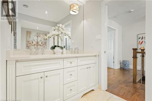 Bathroom featuring vanity and hardwood / wood-style flooring - 659 Deervalley Road, Ancaster, ON - Indoor Photo Showing Bathroom