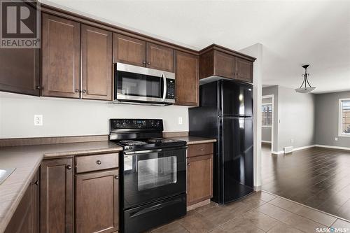 34 4640 Harbour Landing Drive, Regina, SK - Indoor Photo Showing Kitchen