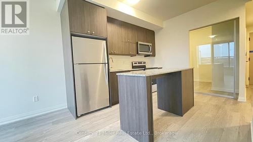 206 - 1415 Dundas Street E, Oakville (1010 - Jm Joshua Meadows), ON - Indoor Photo Showing Kitchen With Stainless Steel Kitchen