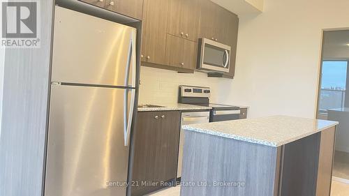 206 - 1415 Dundas Street E, Oakville (1010 - Jm Joshua Meadows), ON - Indoor Photo Showing Kitchen With Stainless Steel Kitchen