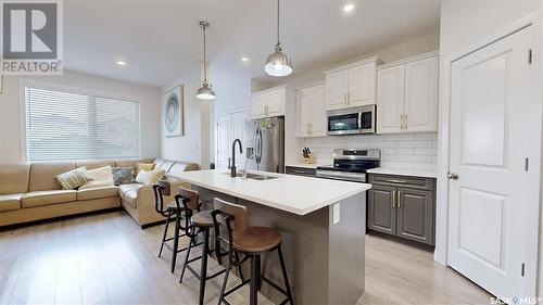 5438 Primrose Green Drive E, Regina, SK - Indoor Photo Showing Kitchen With Double Sink With Upgraded Kitchen