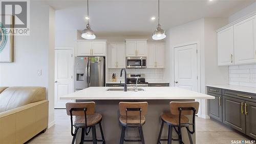 5438 Primrose Green Drive E, Regina, SK - Indoor Photo Showing Kitchen With Double Sink With Upgraded Kitchen