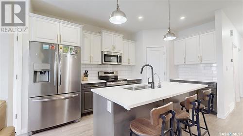 5438 Primrose Green Drive E, Regina, SK - Indoor Photo Showing Kitchen With Double Sink With Upgraded Kitchen