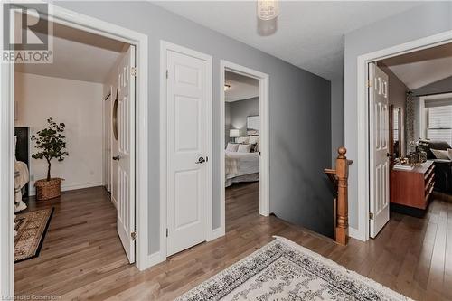 Hall featuring light hardwood / wood-style floors and vaulted ceiling - 17 Weir Drive, Guelph, ON - Indoor