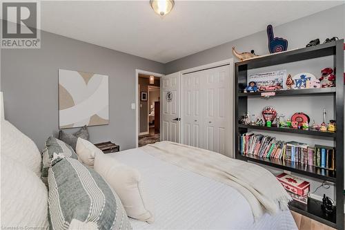 Bedroom featuring hardwood / wood-style floors and a closet - 17 Weir Drive, Guelph, ON - Indoor Photo Showing Bedroom