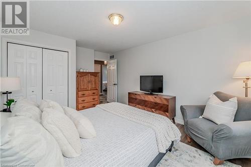 Bedroom featuring hardwood / wood-style floors and a closet - 17 Weir Drive, Guelph, ON - Indoor Photo Showing Bedroom