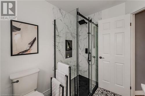 Bathroom with toilet and a shower with shower door - 17 Weir Drive, Guelph, ON - Indoor Photo Showing Bathroom