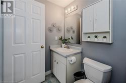 Bathroom featuring vanity and toilet - 