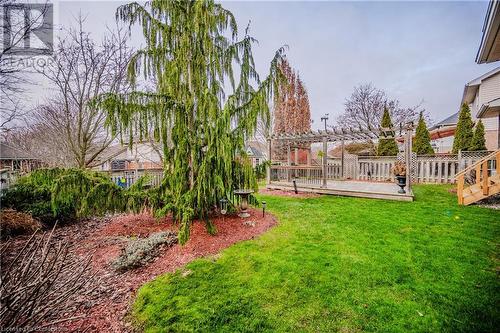 View of yard featuring a pergola and a wooden deck - 17 Weir Drive, Guelph, ON - Outdoor With Deck Patio Veranda