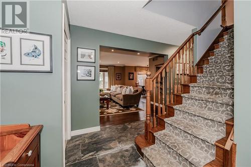 Stairs featuring hardwood / wood-style flooring - 17 Weir Drive, Guelph, ON - Indoor Photo Showing Other Room