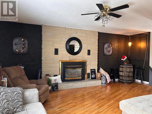 2 Erickson Avenue, Kapuskasing, ON - Indoor Photo Showing Living Room With Fireplace