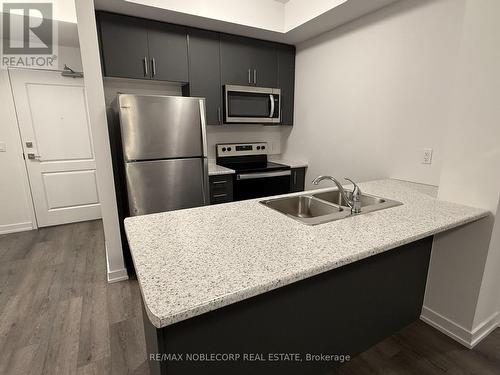 534 - 5055 Greenlane Road, West Lincoln, ON - Indoor Photo Showing Kitchen With Stainless Steel Kitchen With Double Sink