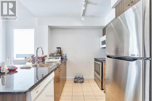 915 - 8 Trent Avenue, Toronto, ON - Indoor Photo Showing Kitchen With Stainless Steel Kitchen With Double Sink