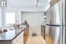 915 - 8 Trent Avenue, Toronto, ON  - Indoor Photo Showing Kitchen With Stainless Steel Kitchen With Double Sink 