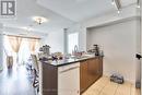 915 - 8 Trent Avenue, Toronto, ON  - Indoor Photo Showing Kitchen With Double Sink 