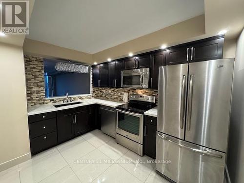 503 - 24 Hanover Road, Brampton, ON - Indoor Photo Showing Kitchen With Upgraded Kitchen