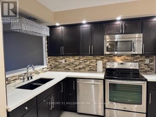 503 - 24 Hanover Road, Brampton, ON - Indoor Photo Showing Kitchen With Double Sink With Upgraded Kitchen