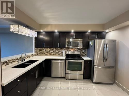 503 - 24 Hanover Road, Brampton, ON - Indoor Photo Showing Kitchen With Double Sink