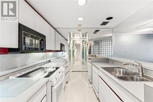 2144 Pelissier Street, Windsor, ON - Indoor Photo Showing Kitchen With Double Sink