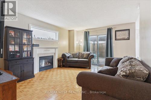 11 Sheardown Trail, Caledon, ON - Indoor Photo Showing Living Room With Fireplace