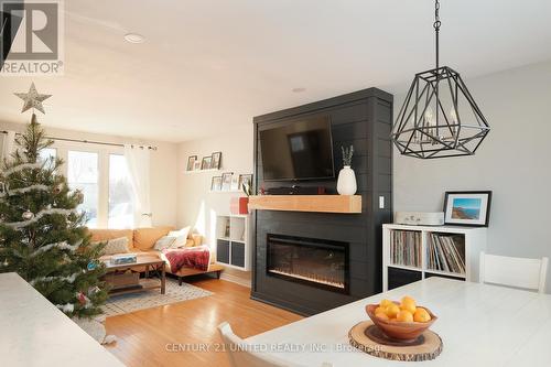 581 Saugeen Crescent, Peterborough (Ashburnham), ON - Indoor Photo Showing Living Room With Fireplace