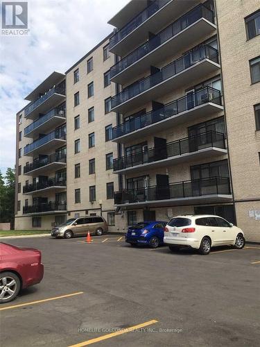 501 - 825 Kennedy Road, Toronto, ON - Outdoor With Balcony With Facade