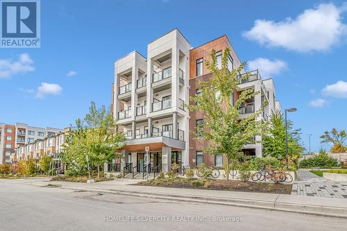 102 - 130 Canon Jackson Drive, Toronto, ON - Outdoor With Facade