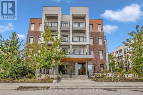 102 - 130 Canon Jackson Drive, Toronto, ON - Outdoor With Facade