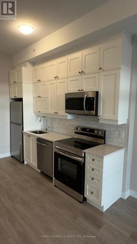 605 - 480 Gordon Krantz Avenue, Milton, ON - Indoor Photo Showing Kitchen With Stainless Steel Kitchen