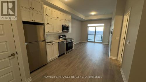 605 - 480 Gordon Krantz Avenue, Milton, ON - Indoor Photo Showing Kitchen With Stainless Steel Kitchen