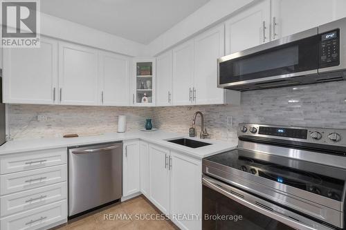 205B - 211 Forum Drive, Mississauga, ON - Indoor Photo Showing Kitchen With Stainless Steel Kitchen With Upgraded Kitchen