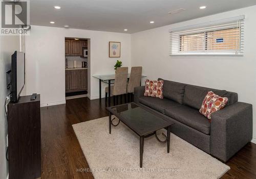 74 Decarie Circle, Toronto, ON - Indoor Photo Showing Living Room