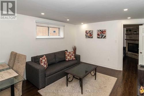 74 Decarie Circle, Toronto, ON - Indoor Photo Showing Living Room