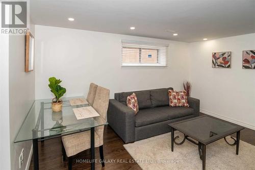 74 Decarie Circle, Toronto, ON - Indoor Photo Showing Living Room