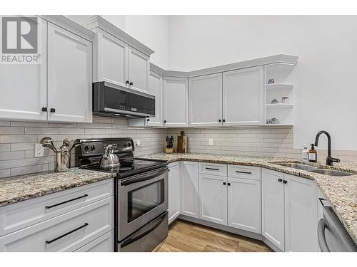 2120 Shannon Ridge Drive Unit# 312, West Kelowna, BC - Indoor Photo Showing Kitchen With Double Sink With Upgraded Kitchen