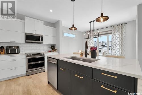 174 Germain Court, Saskatoon, SK - Indoor Photo Showing Kitchen With Double Sink With Upgraded Kitchen