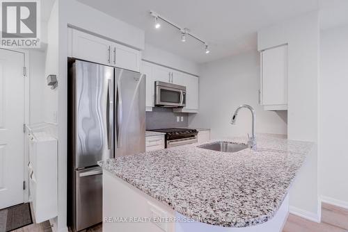 1730 - 38 Grand Magazine Street, Toronto, ON - Indoor Photo Showing Kitchen With Upgraded Kitchen