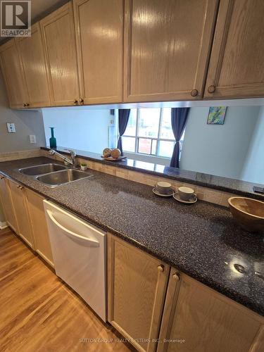 407 - 101 Subway Crescent, Toronto, ON - Indoor Photo Showing Kitchen With Double Sink